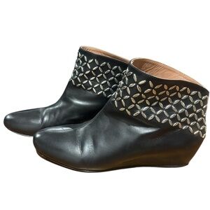 Alaïa
Leather Studded Accents Boots
Women's Size: 38